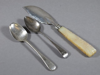 A Georgian silver butter knife with mother of pearl handle  London 1830 and 2 silver Old English pattern teaspoons