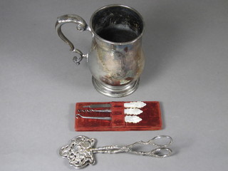 A silver plated baluster pint tankard by James Dixon, 3 ivory  handled manicure implements and a pair of pierced sandwich  servers