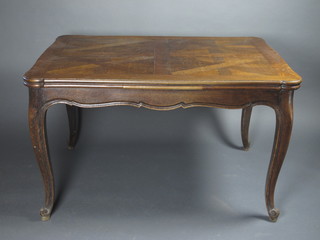 A French oak parquetry topped drawleaf dining table raised on cabriole supports 50"w x 39"d x 30"h
