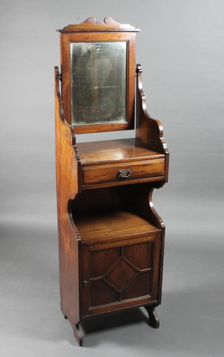 An Edwardian walnut ships type dressing stand with rectangular bevelled plate mirror, the base fitted 1 long drawer above a  recess with cupboard 18"w x 14"d x 63"h