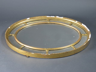 A Georgian style oval plate wall mirror contained in a decorative  gilt frame 38" x 29"