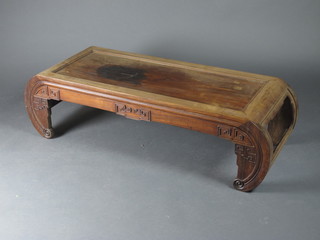 An Oriental hardwood scroll shaped coffee table 45"2 x 17"d x 13"h