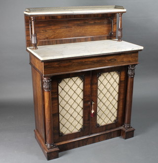 A Regency rosewood chiffonier with raised back and marble top, upper section f, the base fitted a drawer enclosed by grilled  panelled doors and having columns to the side 36"w x 17"d x  48"h  ILLUSTRATED