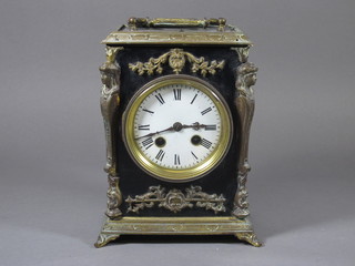 A 19th Century French 8 day striking mantel clock with  enamelled dial and Roman numerals contained in a black lacquered and gilt metal mounted case