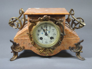 A French Art Nouveau 8 day mantel clock with enamelled dial  and Roman numerals contained in a pink marble and gilt mounted  case