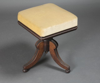 A William IV square rosewood adjustable piano stool, raised on cabriole supports