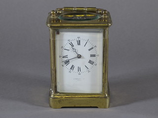 A 19th Century French 8 day carriage clock by Hordon  of Paris, the enamelled dial chipped, contained in a gilt case