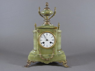 A 19th Century French 8 day striking mantel clock with  enamelled dial and Roman numerals contained in a marble and  gilt mounted case  ILLUSTRATED