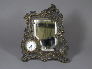 A mantel clock contained within a bevelled plate and bronze  mounted easel table mirror
