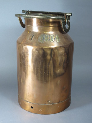 A cylinder shaped Continental copper and brass milk churn  marked 1904
