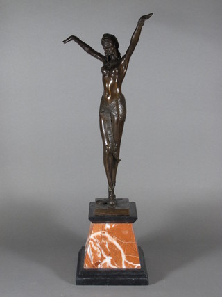 A bronze Art Deco style figure of a standing lady with arms outstretched 21"