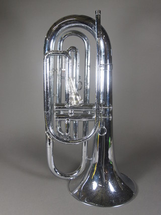A silver 2 valve marching baritone bugle? with 10" valve by Dynasty