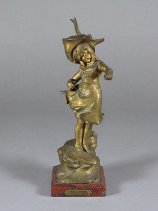 An Art Nouveau French gilt spelter figure of a standing girl -  Sur La Plage 9"