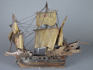 A wooden model of a 2 masted galleon 18"