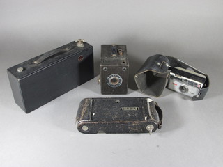 A Kodak brown folding camera, 1 other folding camera, a  Warwick No.2 box camera and a Kodak Instamatic 100 camera