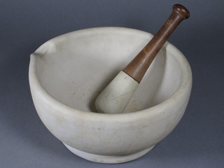 A mortar and pestle 10"