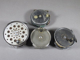 A Sealey twin fish salmon reel 4", 2 Condex centre pin fishing reels 3" and 1 other centre pin reel 3"