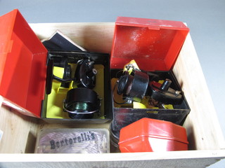 2 Mitchell 300 fishing reels, a centre pin fishing reel 3", a collection of spare spools etc