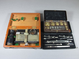 A Stuarts Marine Distance metre patent 498 boxed, a War Office Issued drawing set and a George & Becker Ltd bakelite cased  set of weights,