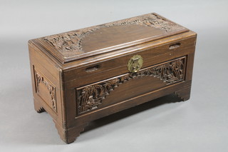 A carved camphor coffer with hinged lid 35"w x 16"d x 18"h