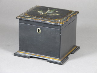 A Victorian papier mache tea caddy with hinged lid, raised on  bracket feet 5"  ILLUSTRATED
