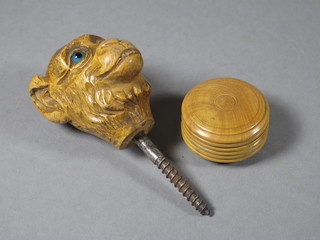 A carved wooden parasol handle in the form of a monkey's head  set glass eyes, together with a cylindrical jar and cover 1"