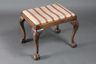 A Queen Anne style rectangular walnut piano stool with  upholstered drop in seat, raised on cabriole supports 21"w x 16"d  x 18"h
