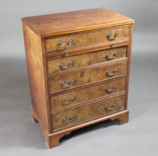 A Queen Anne style walnut chest of 5 long graduated drawers  with brass swan neck drop handles and brushing slide, raised on  bracket feet 28"w x 18"d x 36 1/2"h