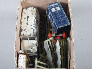 A metal model of a Police Box, a Dinky ambulance etc