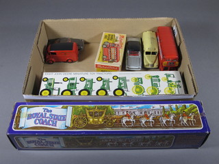 A Dinky Routemaster bus no.289, do. Daimler Ambulance, do.  Ford 2000E Corsair, do. Royal Mail Delivery van, a Milestone  Series double decker bus - boxed, a John Deere model tractor -  The History of Tractors - boxed, The Crescent Toy model Royal  State Coach and a Corgi Renault Floride