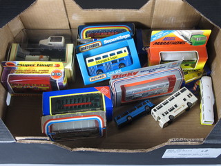 A collection of Corgi and Superking Matchbox model coaches  and buses