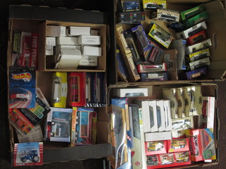 3 boxes containing a collection of various model cars