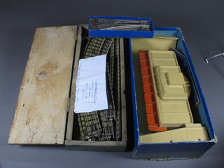 A Hornby Dublo D1 through station and a box containing various track