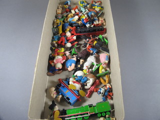 A collection of plastic and other figures