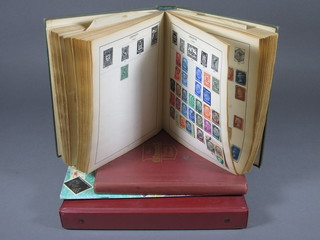 A green Standard album of various GB stamps, a red Standard  album of stamps, 2 Global Master albums of stamps and a New  World album of stamps and other stamps albums