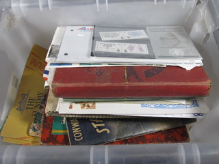 A red Royal Mail album of stamps, a Commando Illustrated  stamp album and a collection of various loose stamps