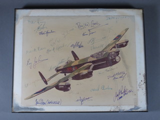 A print of a Lancaster Bomber signed by various members of the  crew 8" x 10"
