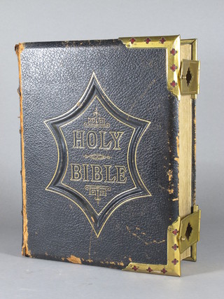 A leather and brass bound family bible