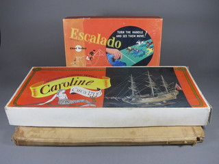 An Escalado racing game, a pin football game and a self  assembly wooden model of The Caroline