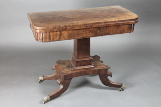 A William IV mahogany D shaped card table raised on a  chamfered square column with triform base and splayed feet 36"  x 17 1/2" x 28"h  ILLUSTRATED