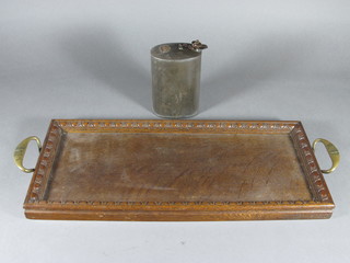 An oval pint oil can and an oak twin handled tray with brass  handles made by St Dunstans patients