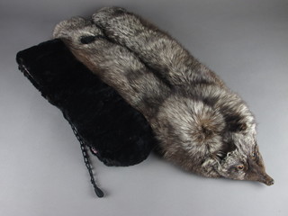 A Silver Fox fur and a black fur stole