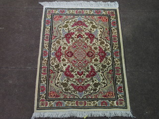 An Iranian Qum silk rug 32" x 22 1/2" complete with certificate