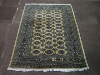 A yellow ground Bokhara rug with 39 octagons to the centre 72"  x 50"