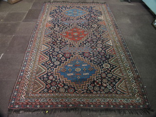 A South West Persian carpet with 3 octagons to the centre within  multi-row 117" x 71 1/2"