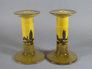 A pair of Royal Doulton brown glazed candlesticks decorated Poplars, the base impressed D340 10", f,