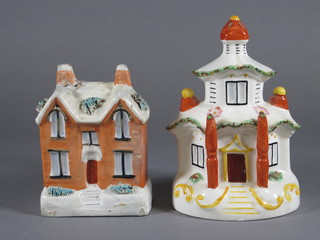 A Staffordshire money box in the form of a cottage - f and r, 5" and 1 other cottage 7"
