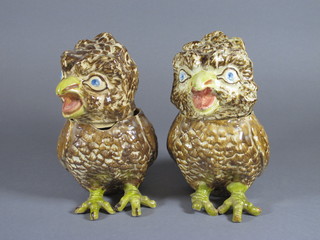 A pair of Martinware style jars and covers in the form of seated  owls 8" - some chips  ILLUSTRATED