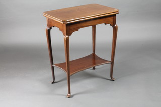 An Edwardian walnut lozenge shaped 2 tier card table raised on cabriole supports, 24"w x 16"d x 29"h