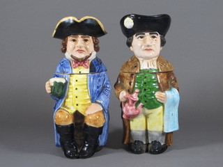 A pair of pottery tankards in the form of standing gentlemen 10"